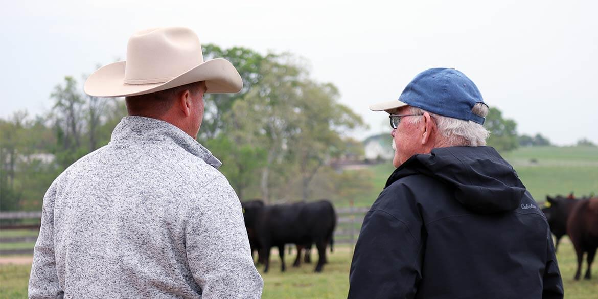 Zach Moffitt talking with breeder